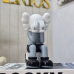 Kaws Sitting